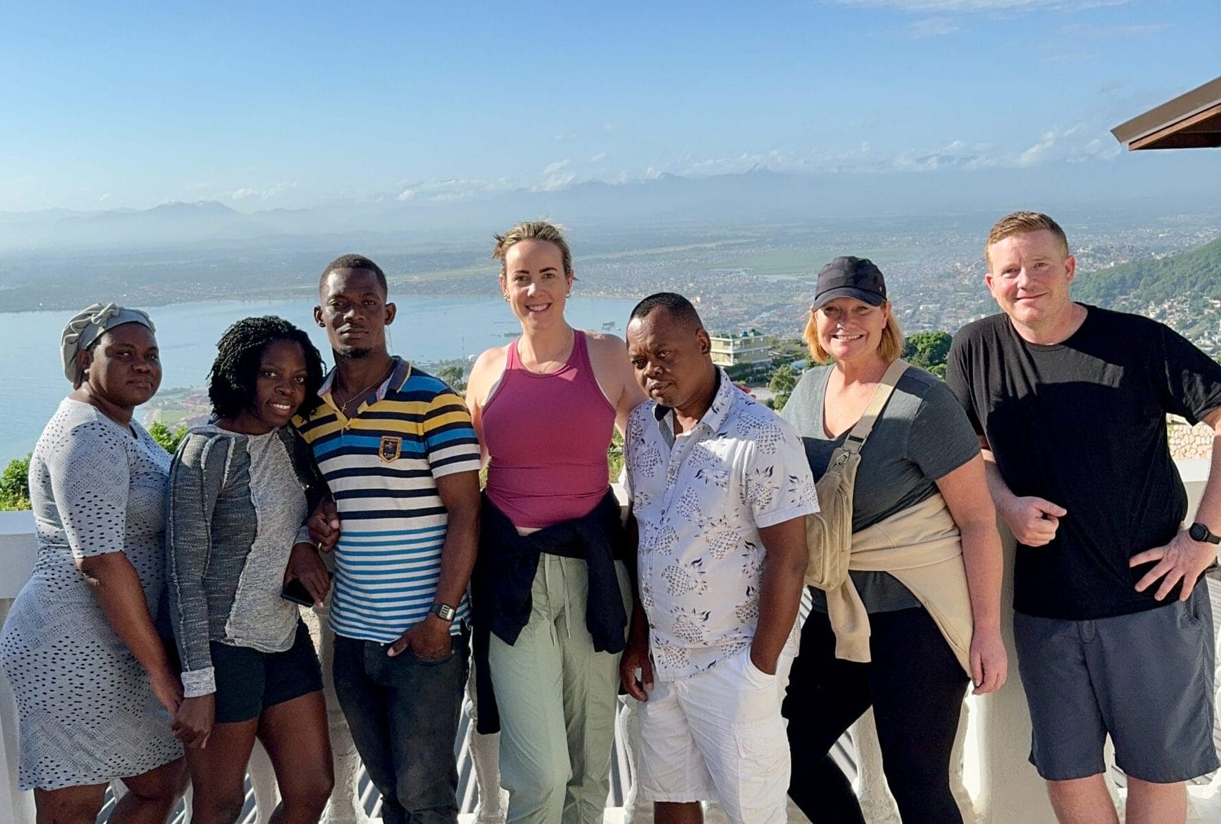 Group of people with scenic mountain view.
