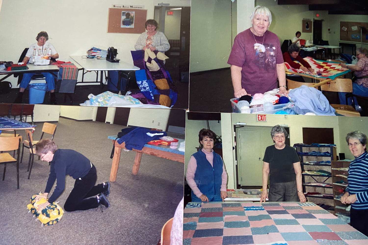 Group of women quilting together in community center.